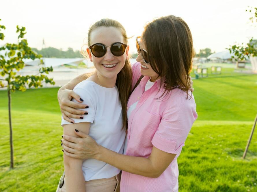Communication of the parent and adolescent, mother hugging daughter